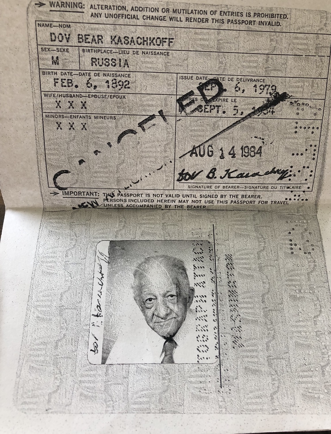 U.S. passport for Dov Bear Kasachkoff, showing his name, photograph, birthplace listed as Russia, and a birth date of February 6, 1892, with a cancelled stamp.