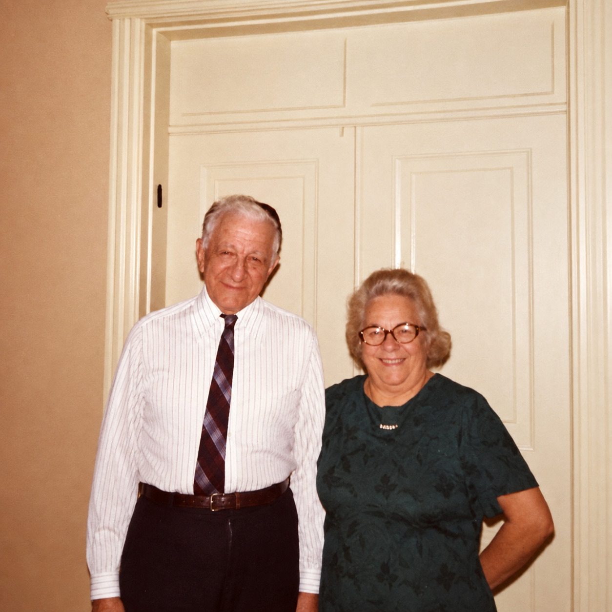 Dov Bear Kasachkoff and Sadie Kasachkoff standing together in a family photograph taken in December 1973.